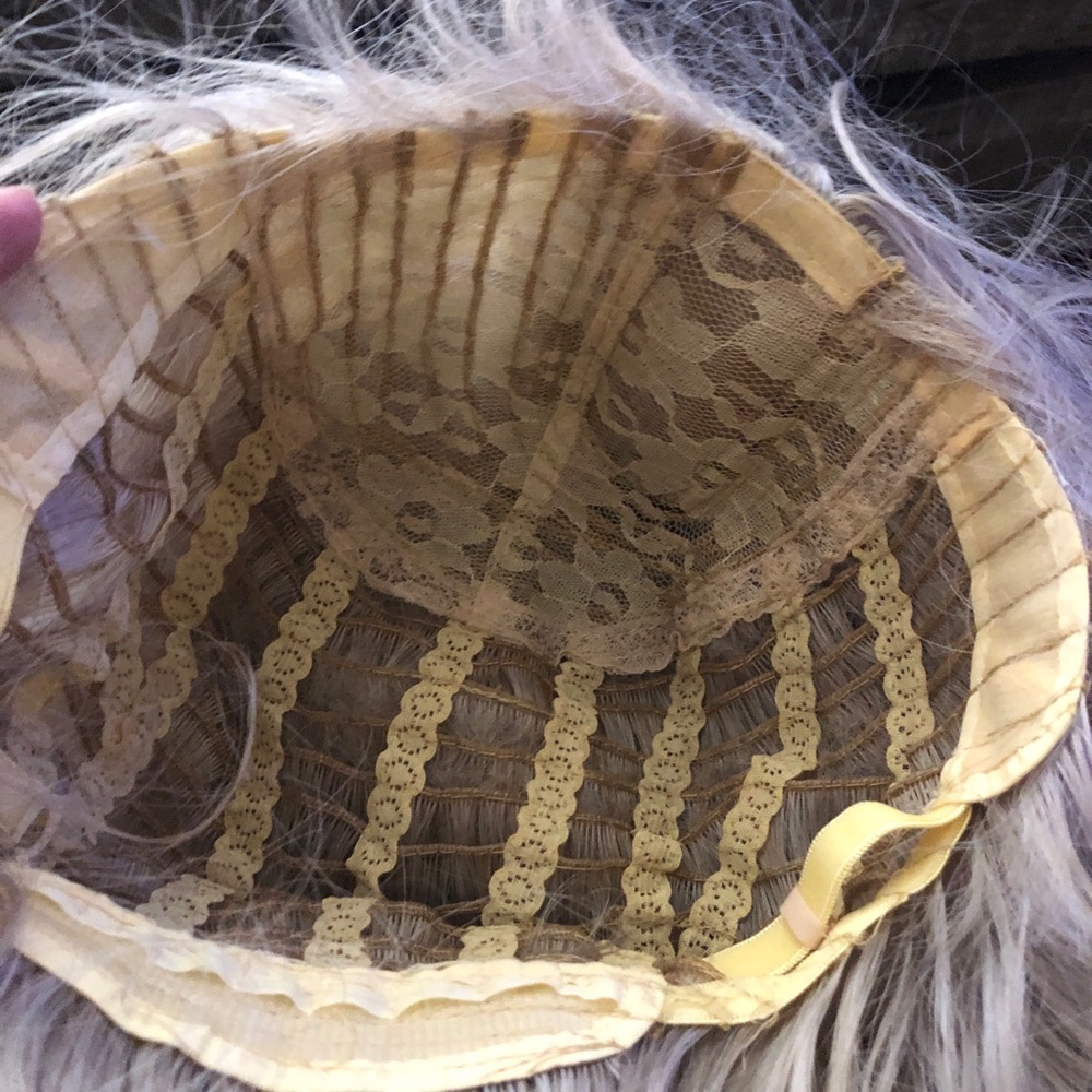 Blond wig. Never used. Has beautiful curls that can be styled your way. Sidepart